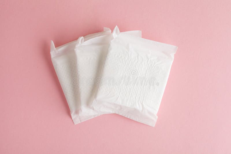 Feminine Hygiene and Protection, Sanitary Pads on Pastel Pink ...