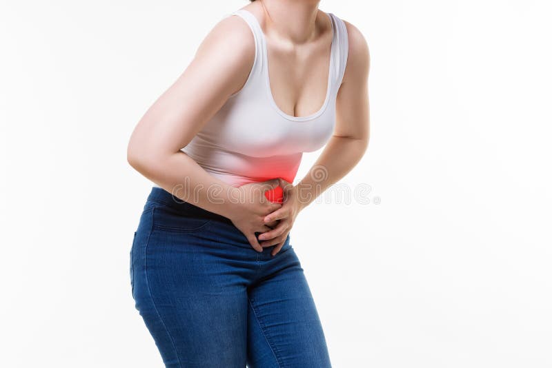 Femme Avec Douleur Abdominale Mal De Ventre Sur Le Fond Beige Image