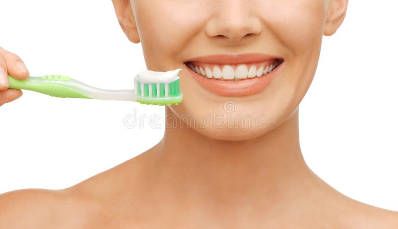 Femme avec la brosse à dents image stock Femme avec la brosse à dents image stock