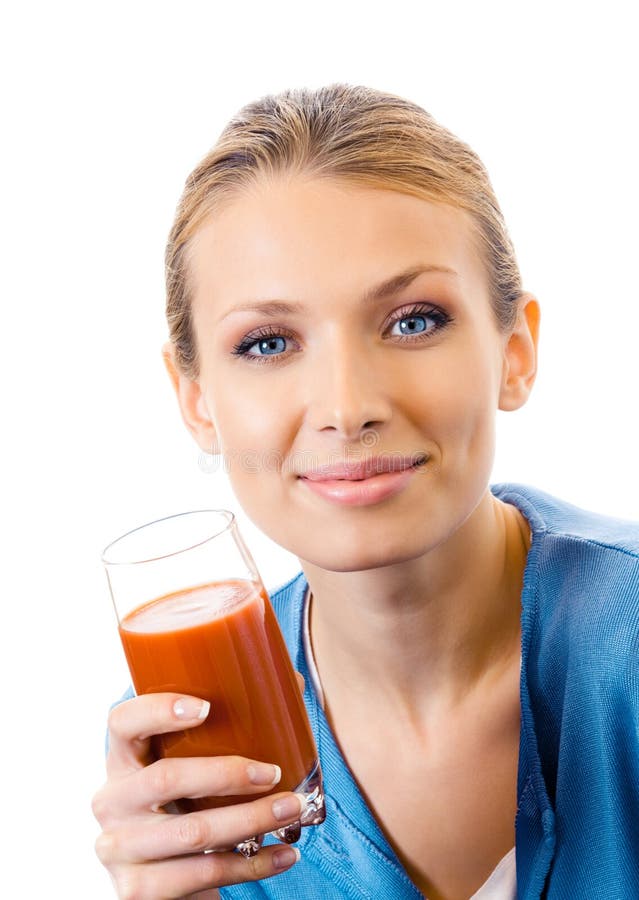 Femme avec le jus de tomates image libre de droits Femme avec le jus de tomates image libre de droits