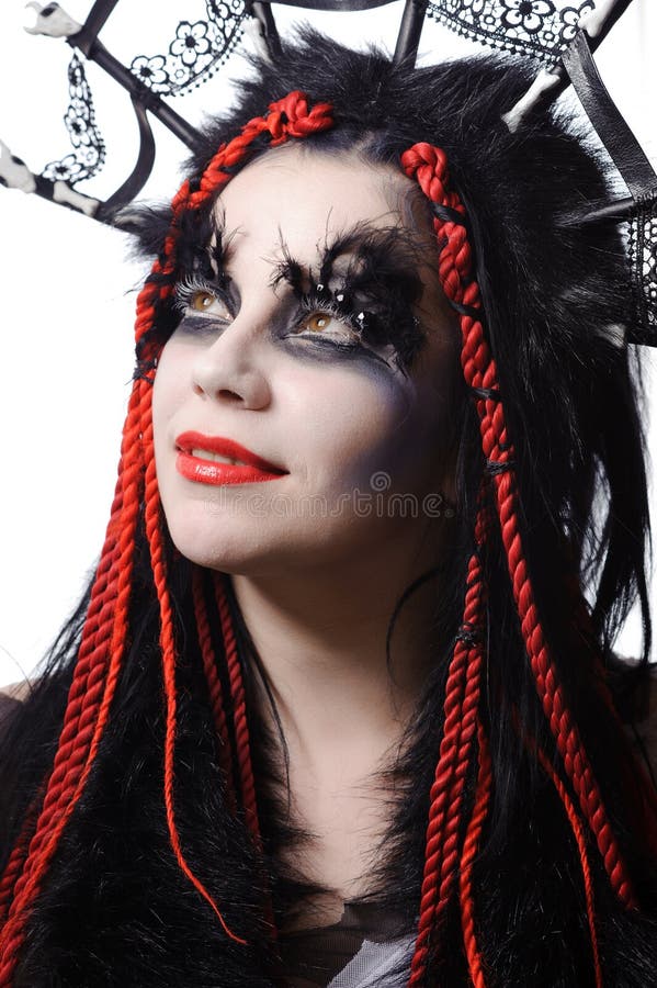 Femme avec le renivellement de shaman de vaudou photographie stock Femme avec le renivellement de shaman de vaudou photographie stock