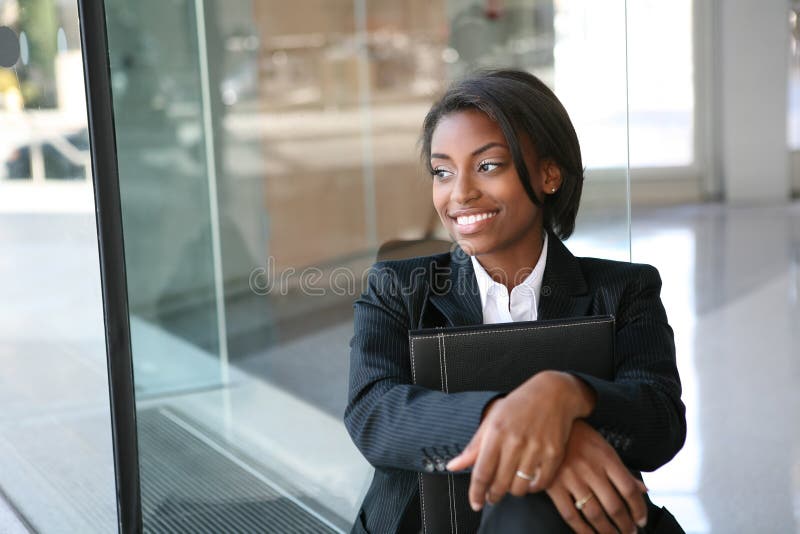 A pretty african american business woman at her company. A pretty african american business woman at her company