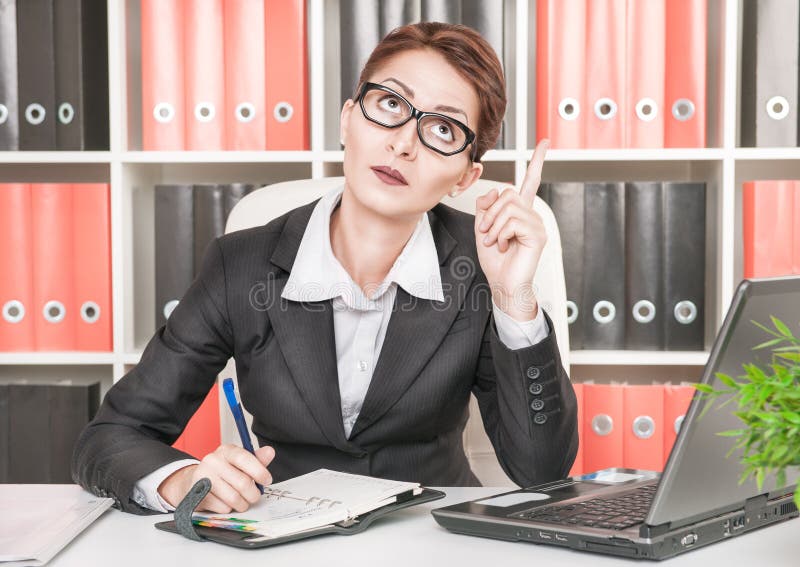 Femme d'affaires ayant une idée photographie stock