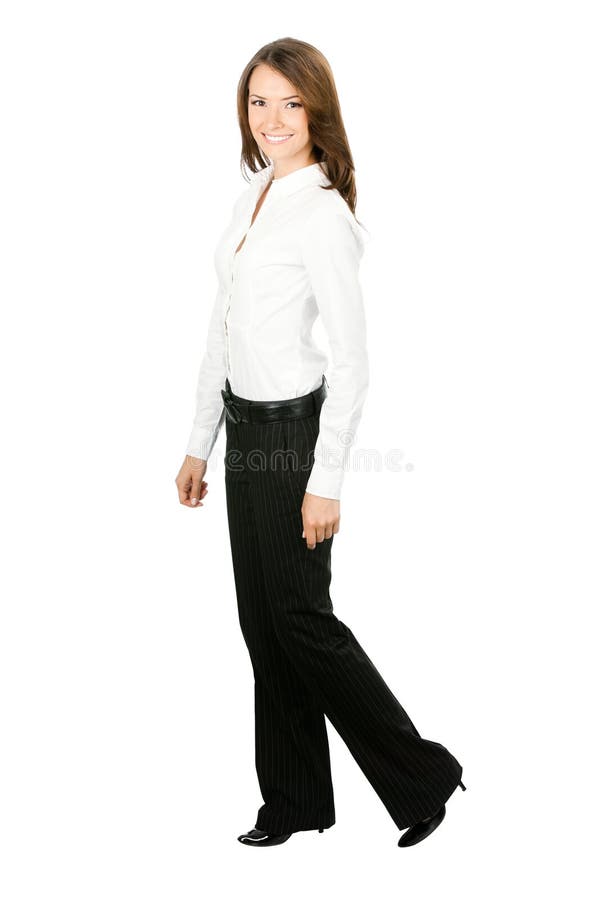 Femme d'affaires marchant, au-dessus du blanc photographie stock libre de droits Femme d'affaires marchant, au-dessus du blanc photographie stock libre de droits