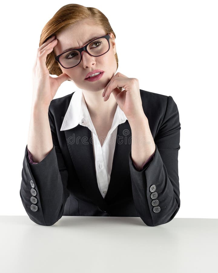 Femme d'affaires rousse pensive et perplexe images stock