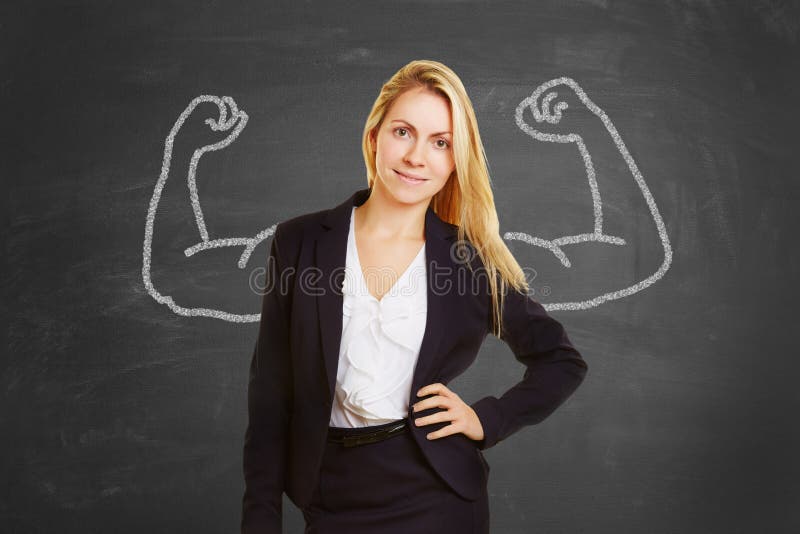 Femme d'affaires réussie avec de faux muscles photographie stock libre de droits Femme d'affaires réussie avec de faux muscles photographie stock libre de droits
