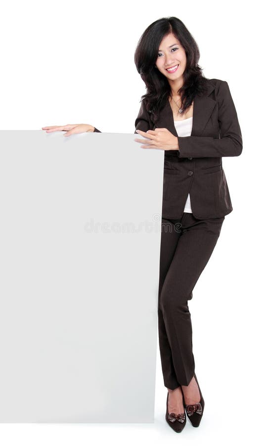 Femme d'affaires tenant un conseil de présentation vide photo libre de droits Femme d'affaires tenant un conseil de présentation vide photo libre de droits