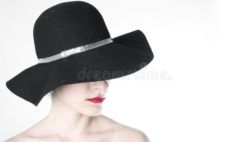 Femme dans le chapeau bling bling de mode de laines photographie stock Femme dans le chapeau bling bling de mode de laines photographie stock