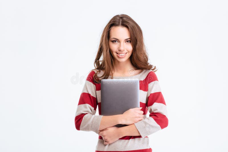 Femme de sourire tenant l'ordinateur portable photos libres de droits Femme de sourire tenant l'ordinateur portable photos libres de droits