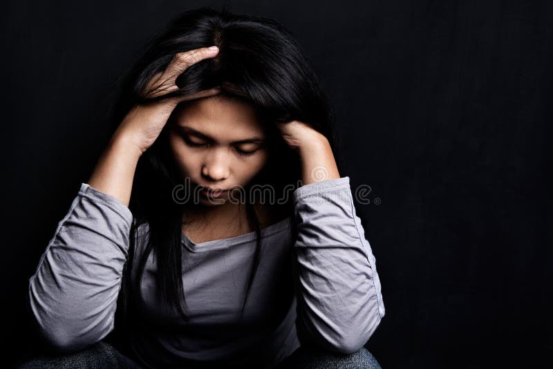 Femme de tension de jeunes photo stock Femme de tension de jeunes photo stock