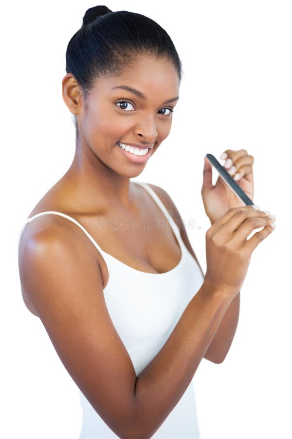 Femme employant le dossier de clou photo stock Femme employant le dossier de clou photo stock