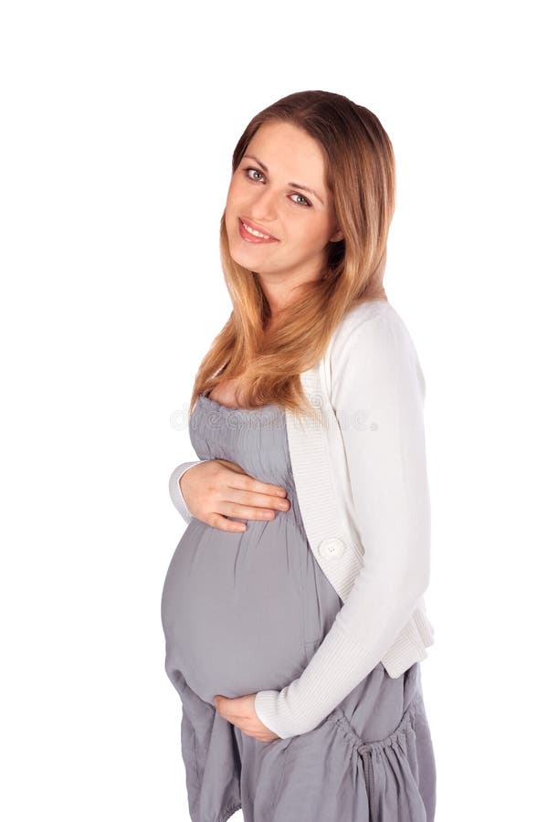 Femme enceinte gai sur le blanc photographie stock libre de droits Femme enceinte gai sur le blanc photographie stock libre de droits