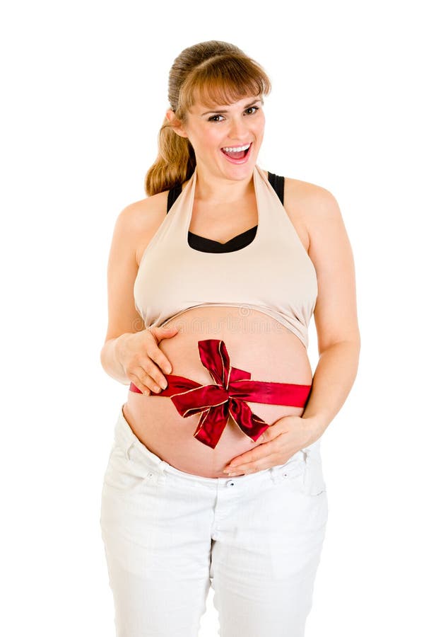 Femme enceinte heureux avec la bande rouge sur le ventre photographie stock libre de droits Femme enceinte heureux avec la bande rouge sur le ventre photographie stock libre de droits