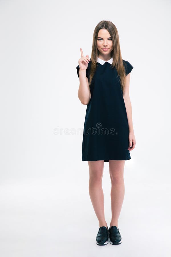 Femme heureuse dirigeant le doigt image libre de droits Femme heureuse dirigeant le doigt image libre de droits