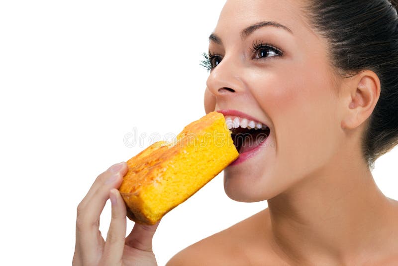 Femme mangeant un tarte macrobiotique image libre de droits Femme mangeant un tarte macrobiotique image libre de droits
