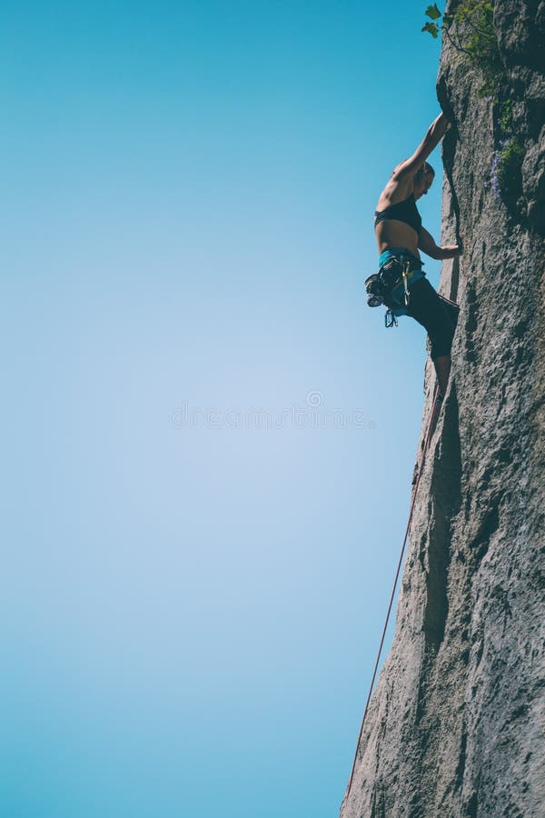Femme occup?e dans le sport extr?me photos stock Femme occup?e dans le sport extr?me photos stock