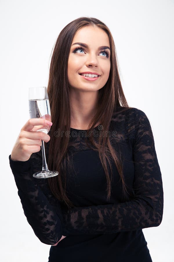 Femme réfléchie jugeant de verre avec le champagne photos libres de droits Femme réfléchie jugeant de verre avec le champagne photos libres de droits