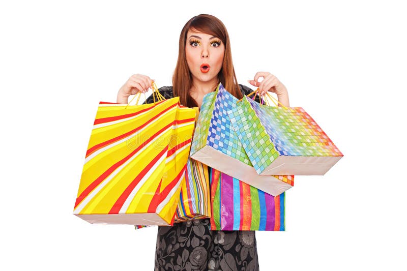 Femme étonné avec des sacs à provisions image stock Femme étonné avec des sacs à provisions image stock