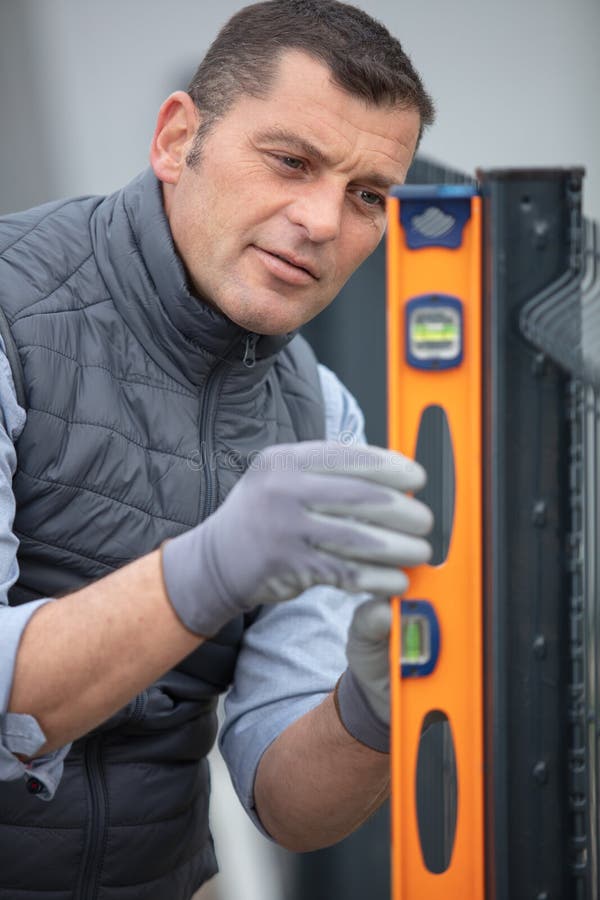 Fence Construction Worker Check Level Metal Post Stock Image Image