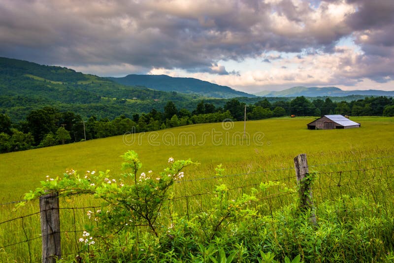 Fence and morning view of mountains in the rural Potomac Highlands of West Virginia.