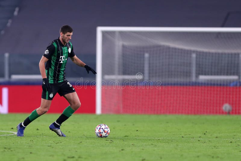 Mats Knoester of Ferencvarosi TC competes for the ball with