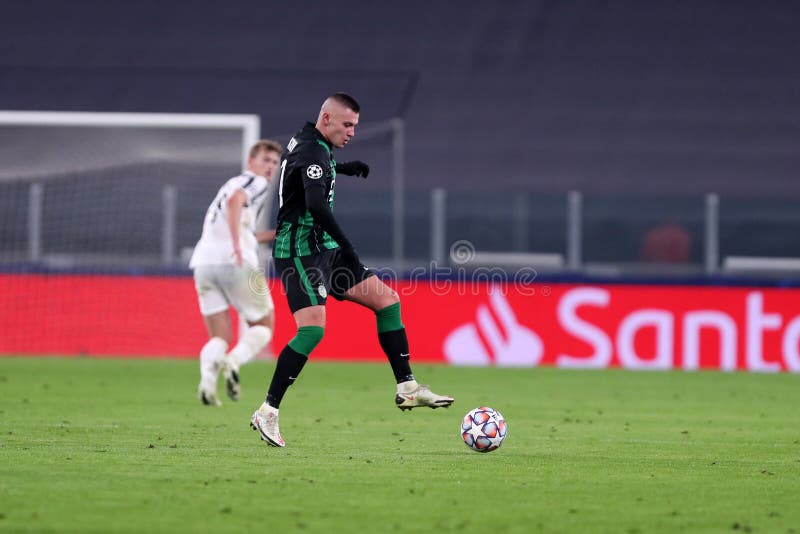 Mats Knoester of Ferencvarosi TC competes for the ball with