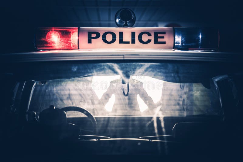 Fermata di traffico dell'incrociatore della polizia fotografia stock libera da diritti Fermata di traffico dell'incrociatore della polizia fotografia stock libera da diritti
