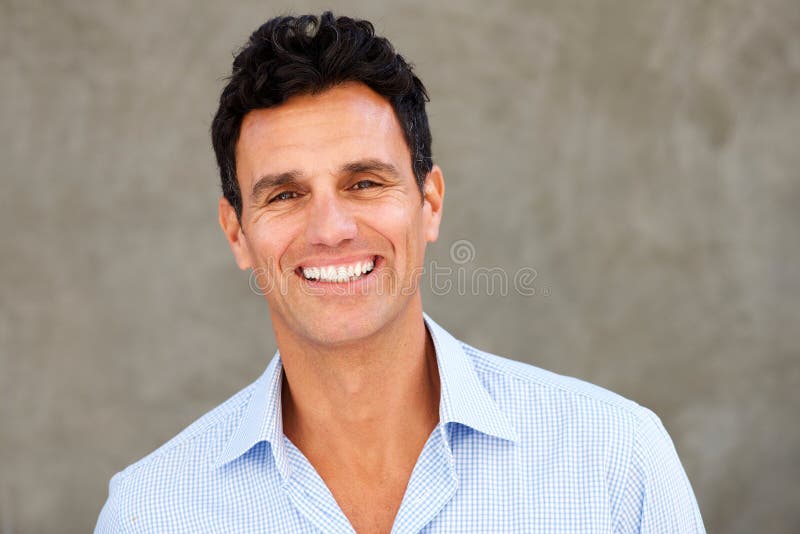 Close up portrait of handsome casual businessman smiling. Close up portrait of handsome casual businessman smiling