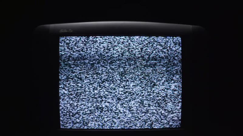 Fernsehschirm an nachts mit weißen Geräuschen ablage Störgeräusch auf dem alten Fernsehschirm in der Dunkelheit