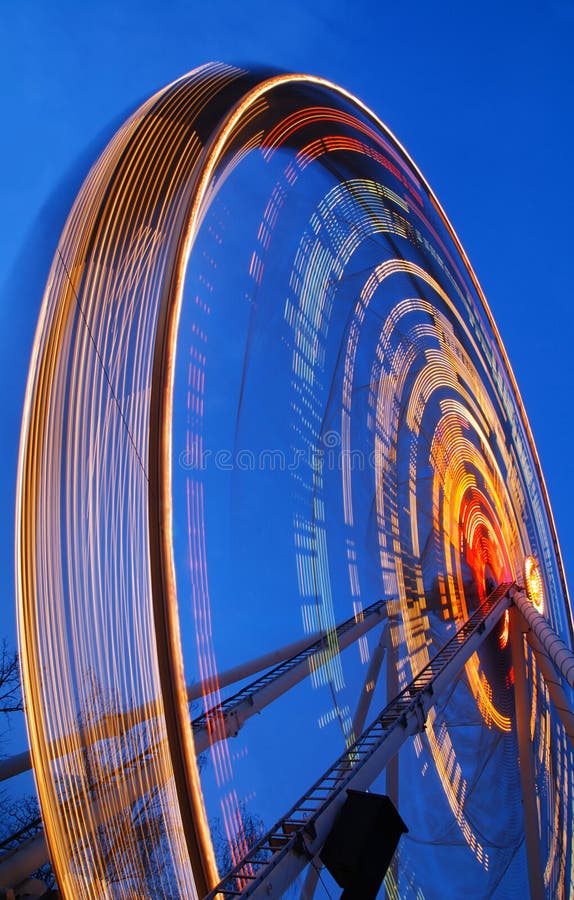 Wheel in motion stock photo. Image of park, funfair, chair 1415544