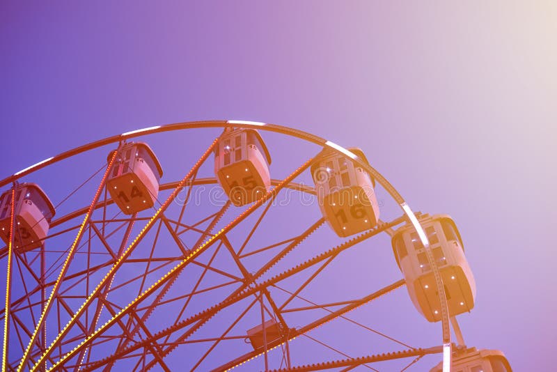 ferris wheel in amusement park at a night city