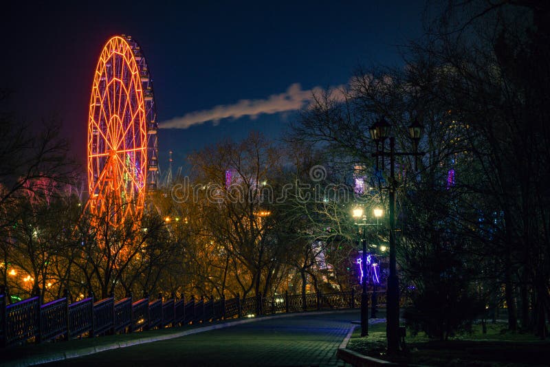 Ferris wheel on the banks of the Amur river in Khabarovsk. Russia. royalty free stock image Ferris wheel on the banks of the Amur river in Khabarovsk. Russia. royalty free stock image