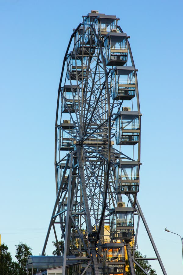 Ferris wheel, entirely against the blue sky stock images Ferris wheel, entirely against the blue sky stock images