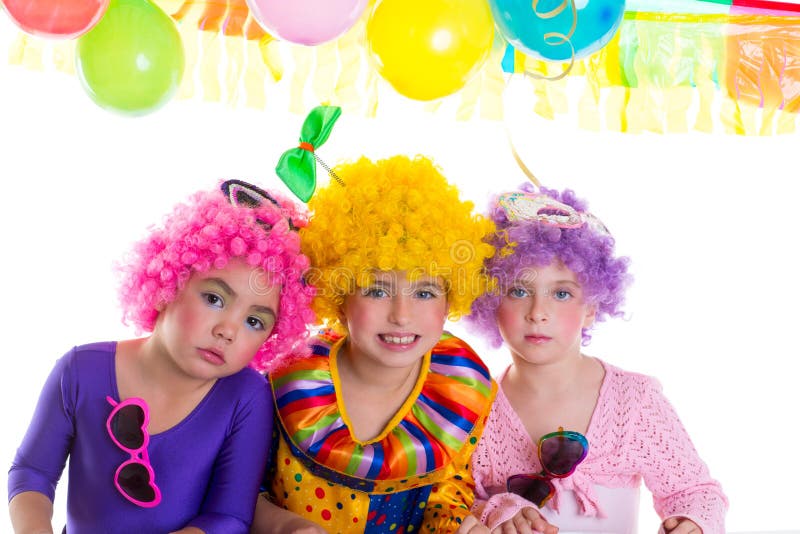 Children happy birthday party with clown wigs colorful holiday celebration. Children happy birthday party with clown wigs colorful holiday celebration