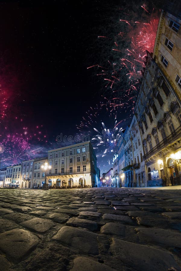 Festival celebration City background with Fireworks. Empty night plaza, old architecture. royalty free stock photo Festival celebration City background with Fireworks. Empty night plaza, old architecture. royalty free stock photo