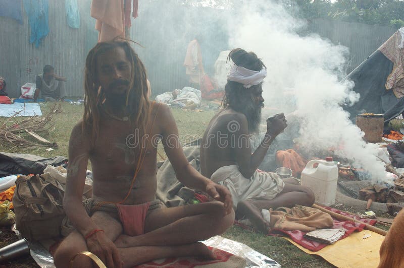 January 13, 2009 ? Ganga sagar, West Bengal, India - SADHU’S STALL AT THE FAIR GROUND. Gangasagar Mela is the largest fair, celebrated in West Bengal (INDIA). This fair is held where the Ganga river and the Bay of Bengal form a nexus. Hence the name Gangasagar Mela. This festival is celebrated during mid January every year and is a major attraction for millions of pilgrims from different parts of the country gather at Gangasagar, the point where the holy river Ganges meets the sea to take a dip and wash away all the earthly sins. January 13, 2009 ? Ganga sagar, West Bengal, India - SADHU’S STALL AT THE FAIR GROUND. Gangasagar Mela is the largest fair, celebrated in West Bengal (INDIA). This fair is held where the Ganga river and the Bay of Bengal form a nexus. Hence the name Gangasagar Mela. This festival is celebrated during mid January every year and is a major attraction for millions of pilgrims from different parts of the country gather at Gangasagar, the point where the holy river Ganges meets the sea to take a dip and wash away all the earthly sins.