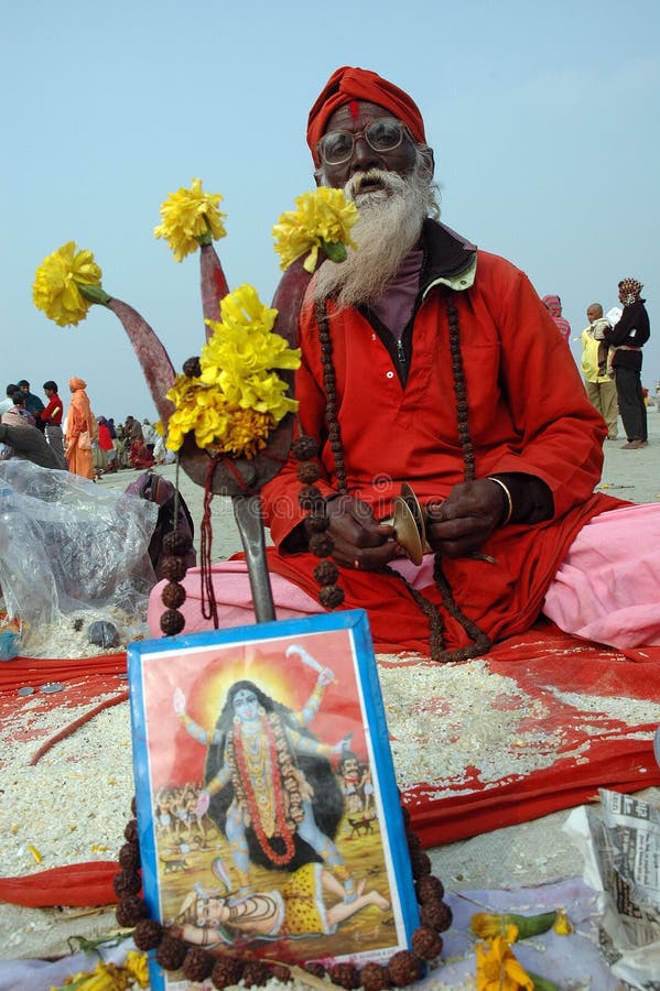 January 14, 2009 ? Ganga sagar, West Bengal, India - A COLORFUL SADHU(SAINT)SINGING RELIGIOUS SONG AT THE FAIR GROUND. Gangasagar Mela is the largest fair, celebrated in West Bengal (INDIA). This fair is held where the Ganga river and the Bay of Bengal form a nexus. Hence the name Gangasagar Mela. This festival is celebrated during mid January every year and is a major attraction for millions of pilgrims from different parts of the country gather at Gangasagar, the point where the holy river Ganges meets the sea to take a dip and wash away all the earthly sins. January 14, 2009 ? Ganga sagar, West Bengal, India - A COLORFUL SADHU(SAINT)SINGING RELIGIOUS SONG AT THE FAIR GROUND. Gangasagar Mela is the largest fair, celebrated in West Bengal (INDIA). This fair is held where the Ganga river and the Bay of Bengal form a nexus. Hence the name Gangasagar Mela. This festival is celebrated during mid January every year and is a major attraction for millions of pilgrims from different parts of the country gather at Gangasagar, the point where the holy river Ganges meets the sea to take a dip and wash away all the earthly sins.