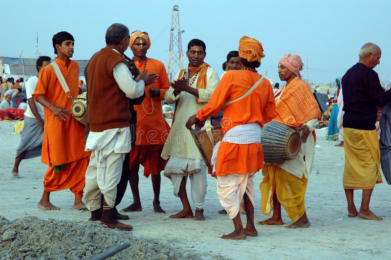 January 14, 2009-Ganga sagar, West Bengal, India -A GROUP OF WANDERING MUSICIANS-THEIR BUSINESS IS SINGING FOR GOD’S SAKE. Gangasagar Mela is the largest fair, celebrated in West Bengal (INDIA). This fair is held where the Ganga river and the Bay of Bengal form a nexus. Hence the name Gangasagar Mela. This festival is celebrated during mid January every year and is a major attraction for millions of pilgrims from different parts of the country gather at Gangasagar, the point where the holy river Ganges meets the sea to take a dip and wash away all the earthly sins. January 14, 2009-Ganga sagar, West Bengal, India -A GROUP OF WANDERING MUSICIANS-THEIR BUSINESS IS SINGING FOR GOD’S SAKE. Gangasagar Mela is the largest fair, celebrated in West Bengal (INDIA). This fair is held where the Ganga river and the Bay of Bengal form a nexus. Hence the name Gangasagar Mela. This festival is celebrated during mid January every year and is a major attraction for millions of pilgrims from different parts of the country gather at Gangasagar, the point where the holy river Ganges meets the sea to take a dip and wash away all the earthly sins.