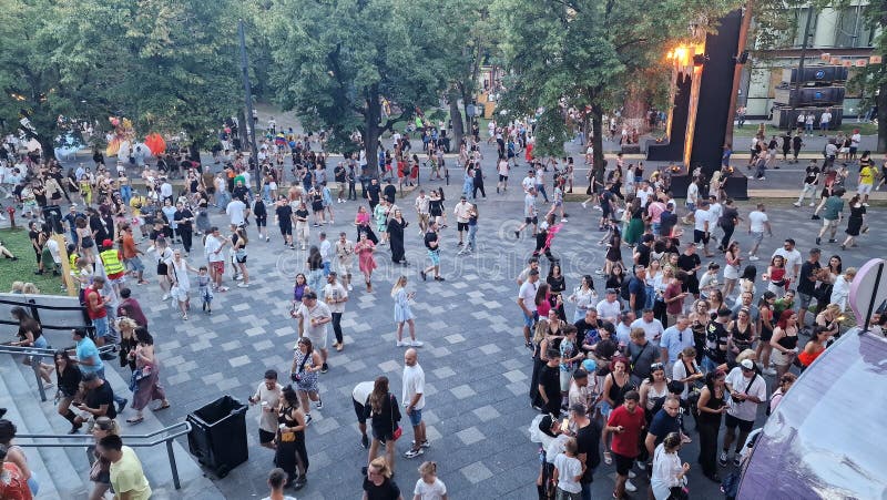 3-6 August 2023. Untold Festival, the largest electronic music festival held in Romania, on Cluj Arena stadium in Cluj-Napoca. People walking around in the Central Park. 3-6 August 2023. Untold Festival, the largest electronic music festival held in Romania, on Cluj Arena stadium in Cluj-Napoca. People walking around in the Central Park.