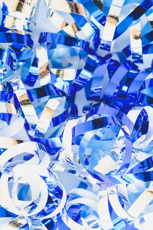Festive Background with Sparkling Blue and Silver Confetti. Festive