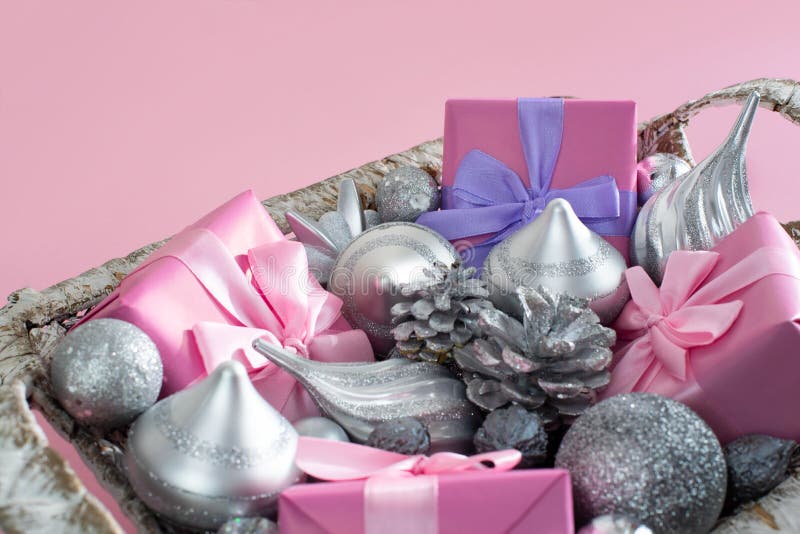 Festive basket with gifts and toys for Christmas Decorative items boxes decoration for the holiday stock photography Festive basket with gifts and toys for Christmas Decorative items boxes decoration for the holiday stock photography