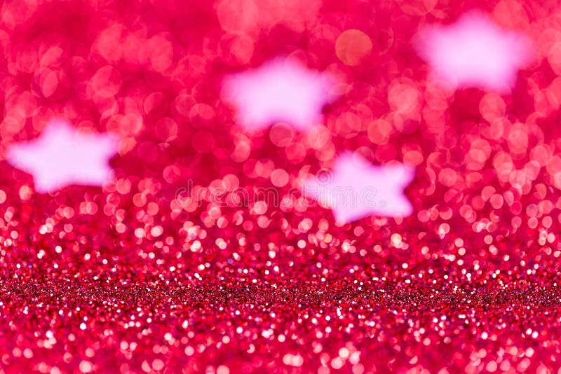 Festive Christmas background with stars. Abstract twinkled bright background with bokeh defocused lights