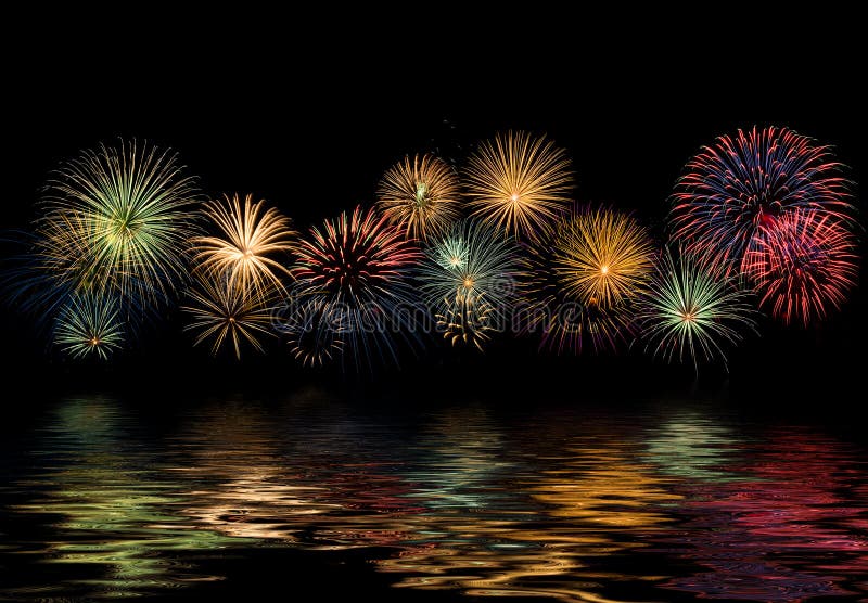 Fireworks display with reflections royalty free stock photos