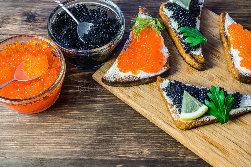 Festive Sandwiches with Red and Black Caviar. Healthy and Tasty Food ...