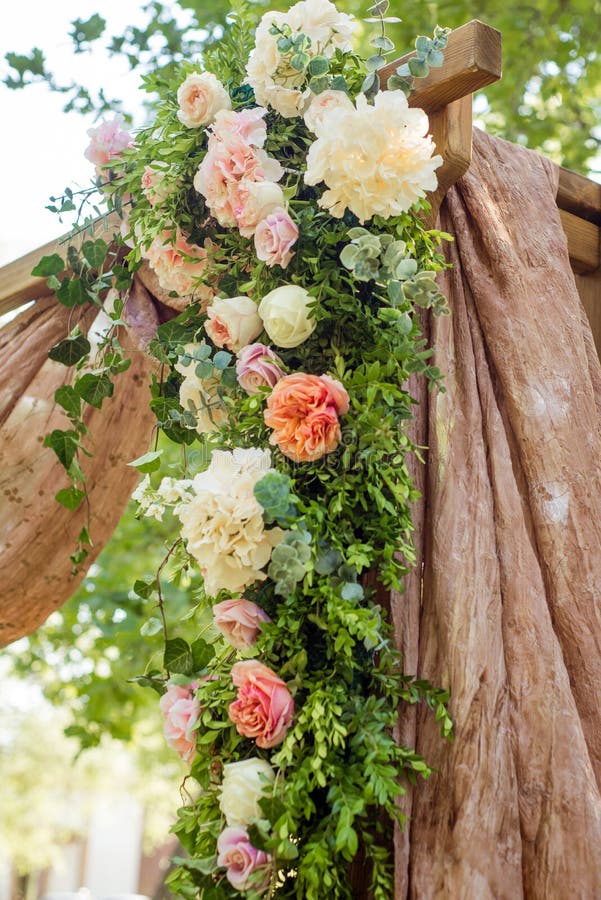 Beautifully Decorated with Flowers Arch for a Wedding Ceremony Stock