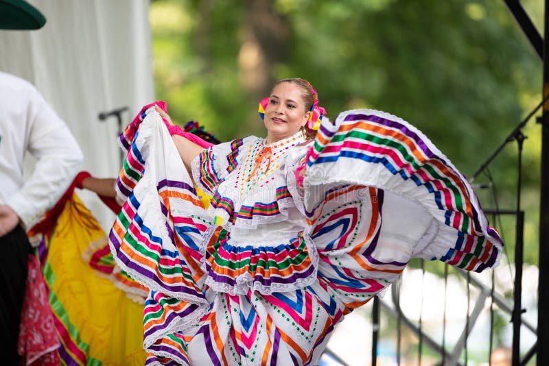 St. Louis, Missouri, USA - August 26, 2018: The Festival of Nations, Men women and children from the Alma de Mexico perform traditional Mexican dances. St. Louis, Missouri, USA - August 26, 2018: The Festival of Nations, Men women and children from the Alma de Mexico perform traditional Mexican dances.