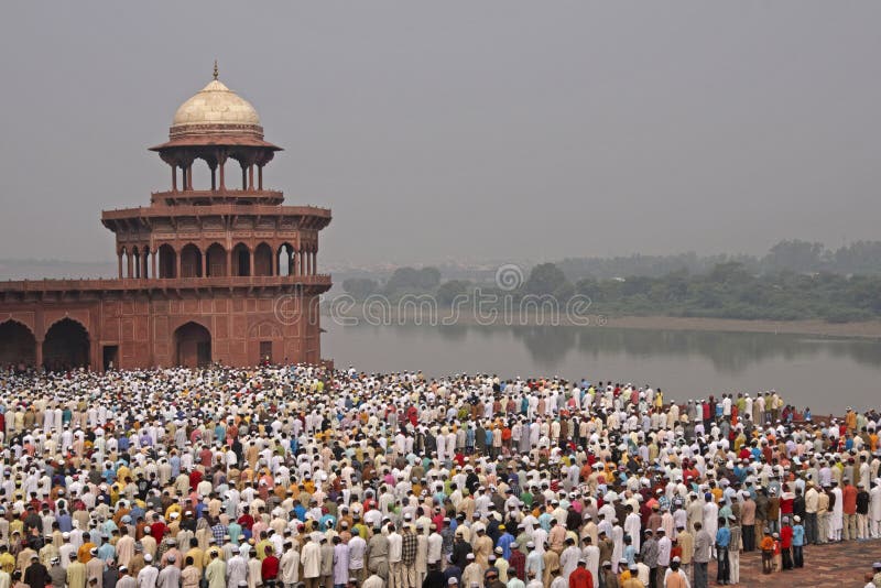 Thousands of people gather in front of the mosque at the Taj Mahal to celebrate the Muslim festival of Eid ul-Fitr in Agra, Uttar Pradesh, India. Thousands of people gather in front of the mosque at the Taj Mahal to celebrate the Muslim festival of Eid ul-Fitr in Agra, Uttar Pradesh, India