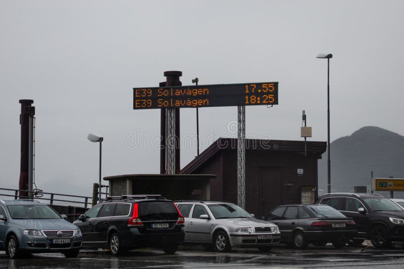 Editorial 09.06.2019 Festøy Ferryport Norway Rainy weather in the port of a small car ferry. Editorial 09.06.2019 Festøy Ferryport Norway Rainy weather in the port of a small car ferry