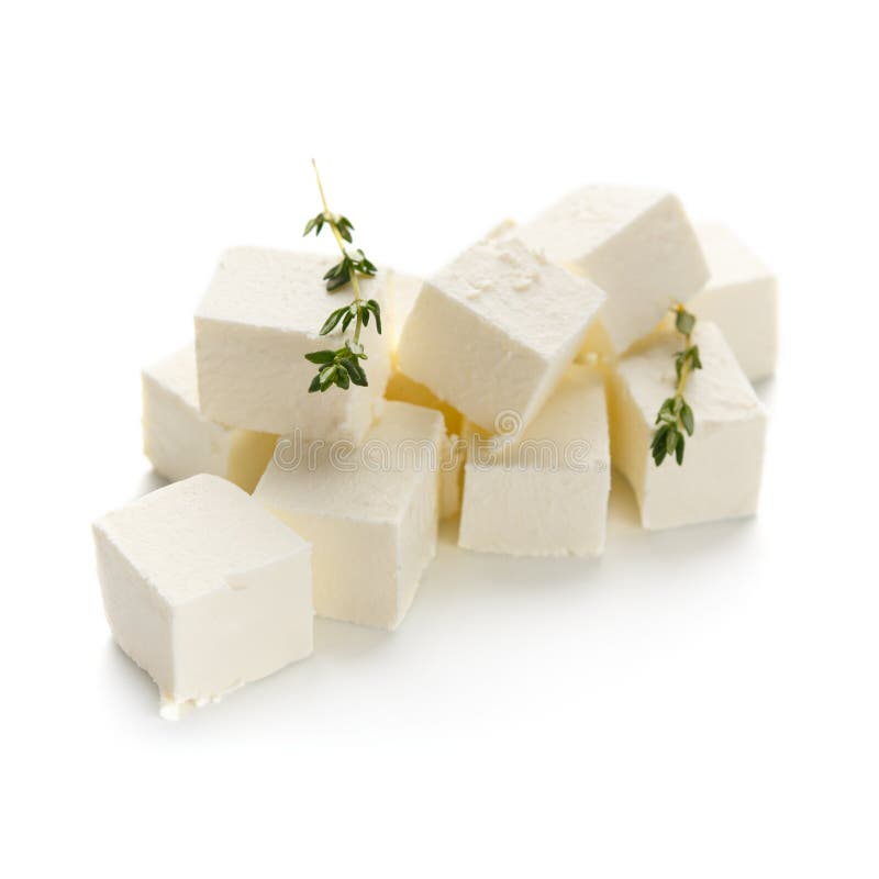 Feta cheese cubes on white stock image. Image of culinary 142985623