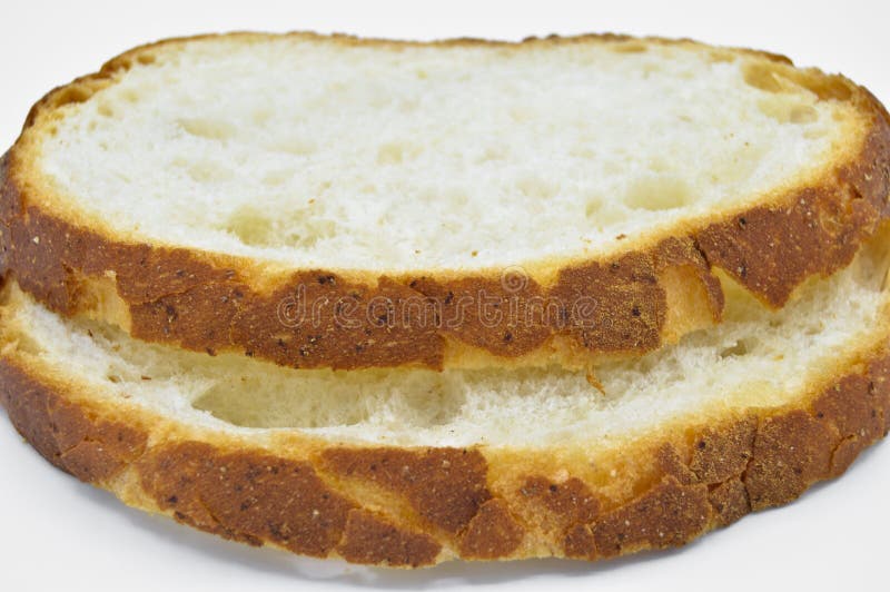 Fetta fresca e saporita tradizionale del pane bianco Crosta, taglio immagine stock libera da diritti Fetta fresca e saporita tradizionale del pane bianco Crosta, taglio immagine stock libera da diritti